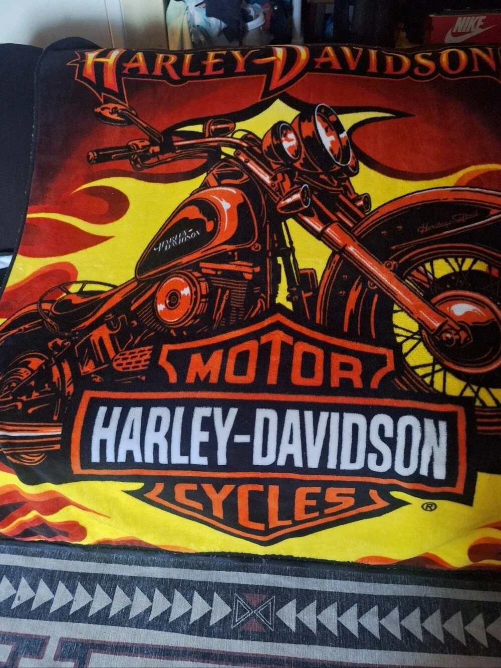 Harley Davidson Blanket in black and orange is a cozy and stylish addition.